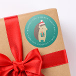 Winter Friends | Hedgehog Holiday Classic Round Sticker<br><div class="desc">Add a unique touch to your holiday envelopes with our Winter Friends holiday stickers. The festive stickers feature a cute,  cartoon hedgehog wearing a winter hat and holding a gift with your custom greeting and family's name bordering the sticker against a teal green background.</div>