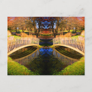 Winter garden with pond and bridges postcard