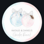Winter Gender Reveal Baby Shower Classic Round Sticker<br><div class="desc">Add a surprising twist to your holiday festivities with our Christmas Gender Reveal Favour Round Stickers! Perfect for your reveal party,  these pink and blue stickers are great for your party favour packaging. Matching items in our store Cava Party Design.</div>