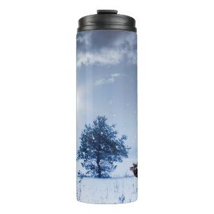Winter landscape in blue colour. Lonely tree and w Thermal Tumbler