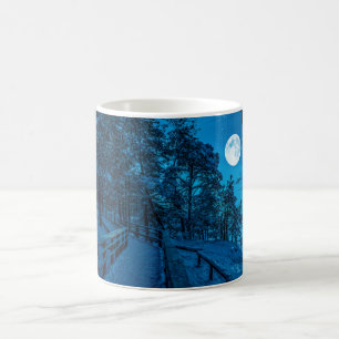Winter landscape with snow covered pine forest coffee mug