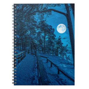 Winter landscape with snow covered pine forest notebook