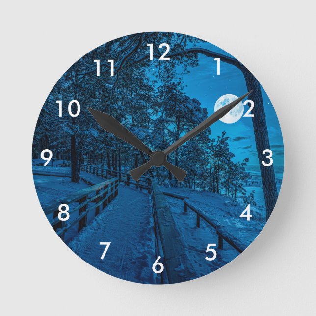 Winter landscape with snow covered pine forest round clock (Front)