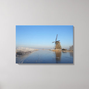 Winter landscape with windmill and ice canvas print