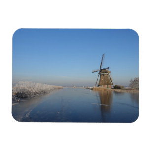 Winter landscape with windmill and ice magnet