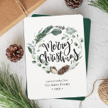 Winter Nature | Watercolor Wreath Christmas Holiday Card<br><div class="desc">Send holiday greetings to friends and family in simple, chic, elegant and modern non-photo design festive, natural nature colour style cards! A beautiful wreath frame of soft green painted watercolor leaves (pine tree, eucalyptus, fern), featuring a pretty brown pine cone in front. The middle features the greeting "merry christmas" in...</div>