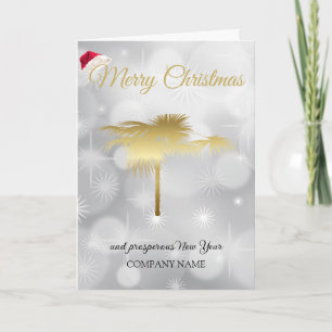 Winter snow festive golden palm tree, Santa's cap Holiday Card