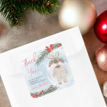 Winter snow ice Christmas baby shower Square Sticker<br><div class="desc">Baby, It's cold outside! Perfect thank you sticker with Modern Christmas winter illustration with red flowers, green pine tree branches, mistletoe and snow featuring a Christmas glass ball ornament with a gender neutral baby clothing and modern script baby shower with a modern calligraphy typography with flowers on winter ice blue...</div>