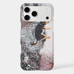 Winter snow scene with cute black and tan dog