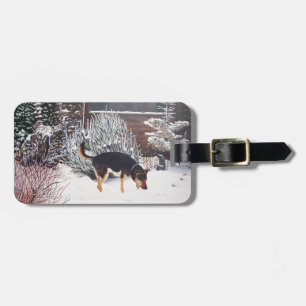 Winter snow scene with cute black and tan dog luggage tag