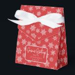 Winter Snowflake Christmas Red Holiday Greeting Favor Box<br><div class="desc">Christmas red favour box with ribbon bow and simple holiday greeting tag. Box is emblazoned with white and grey snowflakes of varying sizes. Perfect for party take-aways, host gifts, baked goods, and more. Design is available in a curated collection of modern holiday colours. Contact us for any customizations. Happy holidays!...</div>