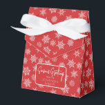Winter Snowflake Christmas Red Holiday Greeting Favor Box<br><div class="desc">Christmas red favour box with ribbon bow and simple holiday greeting tag. Box is emblazoned with white and grey snowflakes of varying sizes. Perfect for party take-aways, host gifts, baked goods, and more. Design is available in a curated collection of modern holiday colours. Contact us for any customizations. Happy holidays!...</div>
