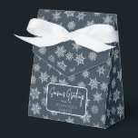 Winter Snowflake Navy Blue Holiday Greeting Favor Box<br><div class="desc">Navy blue favour box with ribbon bow and simple holiday greeting tag. Box is emblazoned with white and grey snowflakes of varying sizes. Perfect for party take-aways, host gifts, baked goods, and more. Design is available in a curated collection of modern holiday colours. Contact us for any customizations. Happy holidays!...</div>