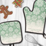 Winter Snowflakes on Green Cute Ombre Christmas Oven Mitt & Pot Holder Set<br><div class="desc">Add a touch of winter elegance to your kitchen with this beautiful oven mitt and pot holder set featuring a delicate pattern of white snowflakes on a green ombre background. Perfect for bringing festive charm to your culinary space, this set is both stylish and functional. Customize it with your name...</div>