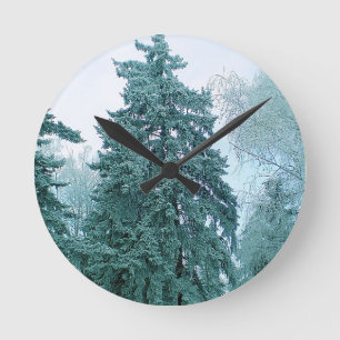 Winter spruce with snow round clock