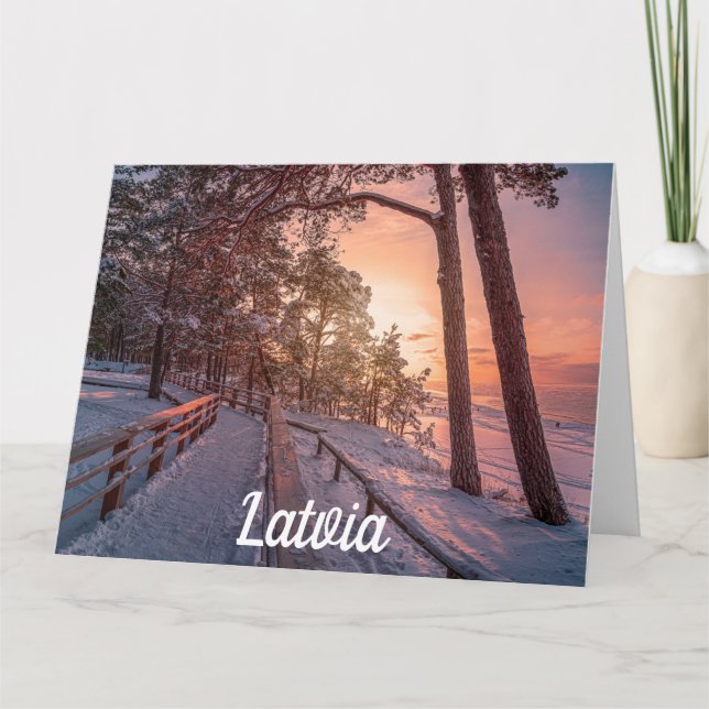 Winter sunset in pine forest near sea card (Front)