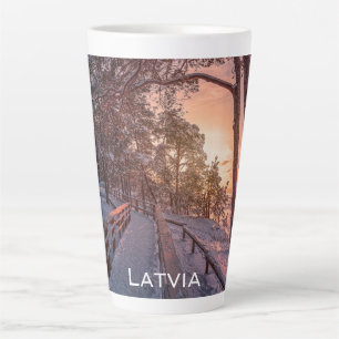 Winter sunset in pine forest near sea latte mug