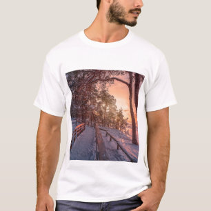 Winter sunset in pine forest near sea T-Shirt