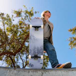 Winter wonderland, fog, spruce forest and mountain skateboard