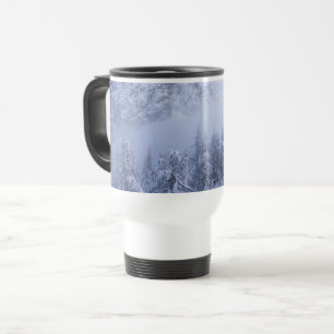 Winter wonderland, fog, spruce forest and mountain travel mug