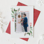 Winterberry and Holly Wedding Christmas Photo Holiday Card<br><div class="desc">Celebrate your first Christmas as a married couple with our customizable photo wedding Christmas card featuring watercolor holly and winterberry. This elegant holiday card design combines the timeless beauty of holly leaves and winterberries with a delicate watercolor effect, creating a festive yet romantic look that’s perfect for newlyweds. Personalize your...</div>