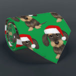 Wirehaired Dachshund Santa Teckel Christmas Dog Tie<br><div class="desc">Add some holiday cheer to your wardrobe with this festive green neck tie featuring an allover print of an adorable wirehaired dachshund wearing a Santa hat. Whether you're heading to the office Christmas party or a more formal holiday event, this unique and eye-catching neck tie is sure to get you...</div>