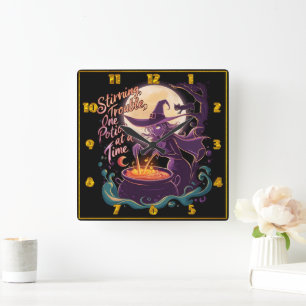 Witch brewing potions under a full moon square wall clock