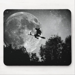 Witch flying on the broom with her cat mouse pad