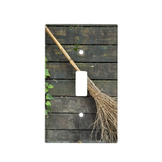 Witches broom light switch cover