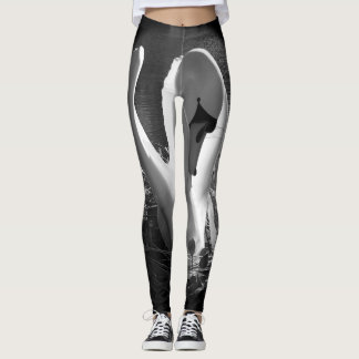 With black and white stylized swan image leggings