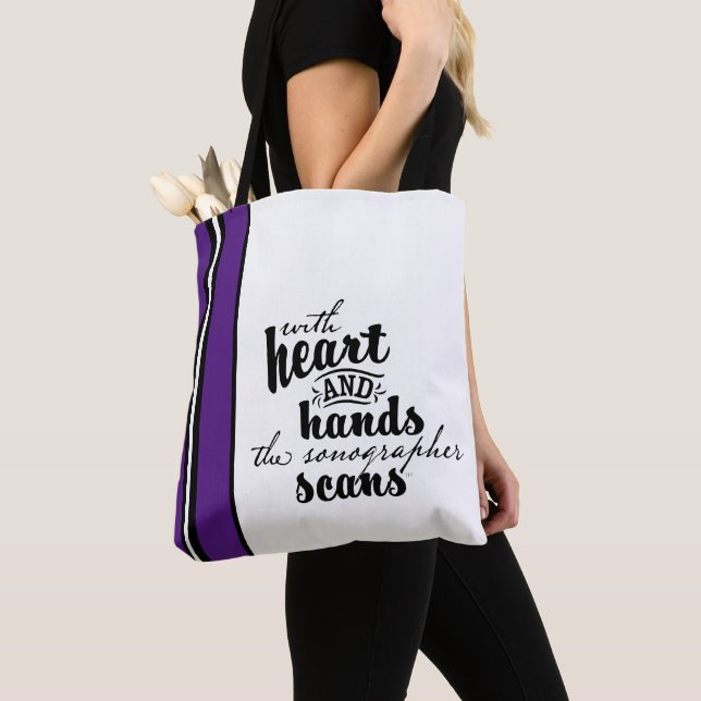 With Heart and Hands the Sonographer Scans Tote Bag (Close Up)