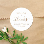 With Love Gold Script Wedding Thank You Classic Round Sticker<br><div class="desc">Chic thank you sticker for your wedding reception favours and thank you cards featuring "With Love   Thanks" in a blend of simple gold lettering and an elegant gold script with swashes,  your first names joined together by a heart and your wedding date.</div>