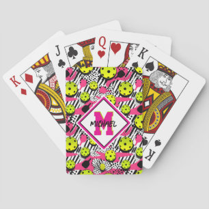 With monogram yellow pickleballs on pink playing cards