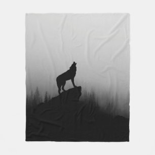 Wolf howling at the moon fleece blanket