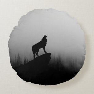 Wolf howling at the moon round pillow