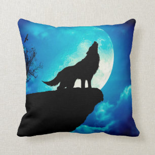 Wolf in silhouette howling to the full moon throw pillow