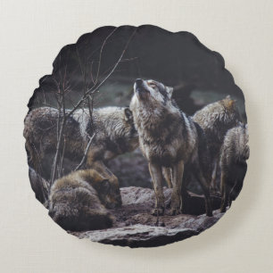 WOLF PACK ON ROCK FORMATION ROUND PILLOW