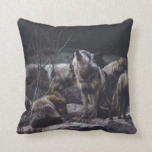 WOLF PACK ON ROCK FORMATION THROW PILLOW