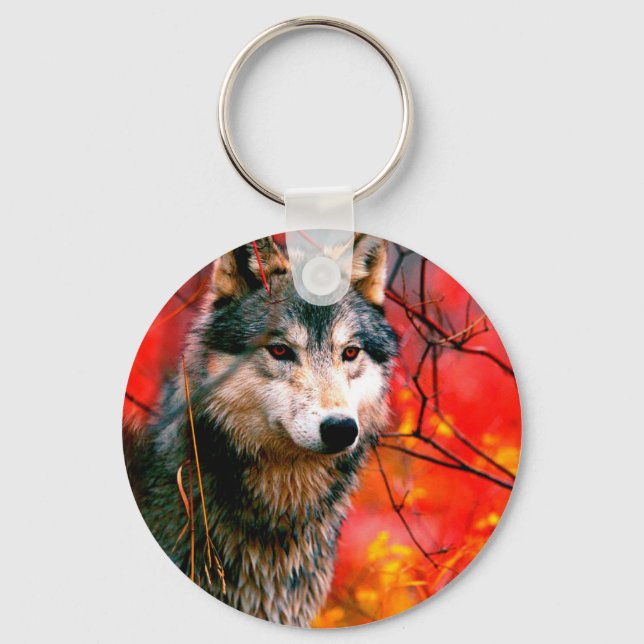 Wolf peeking through leaves in a forest keychain (Front)