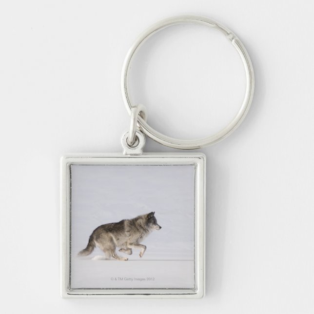 Wolf running in the snow 2 keychain (Front)