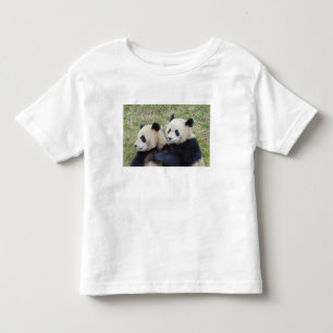 Wolong Reserve, China, Giant panda hugging Toddler T-shirt