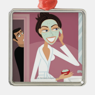Woman applying facial mask metal ornament