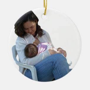 Woman breastfeeding ceramic ornament