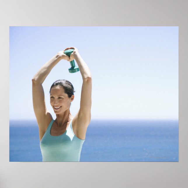 woman excercising with weights on her roof poster (Front)