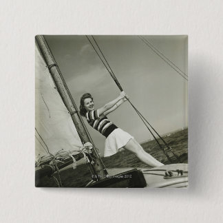Woman Holding Rigging on Yacht 2 Inch Square Button