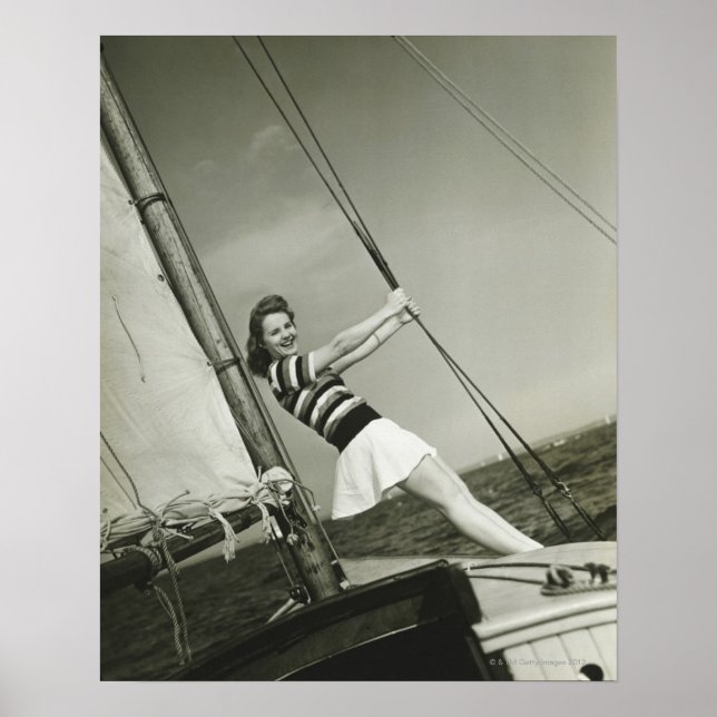 Woman Holding Rigging on Yacht Poster (Front)