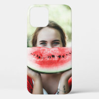 Woman holding sliced watermelon