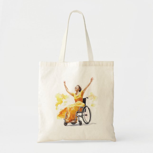 Woman in a wheelchair dances joyfully tote bag (Front)