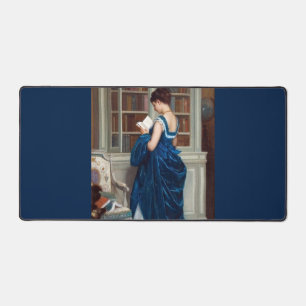 Woman in Blue reading a book Desk Mat