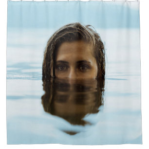 Woman in body of water in the morning